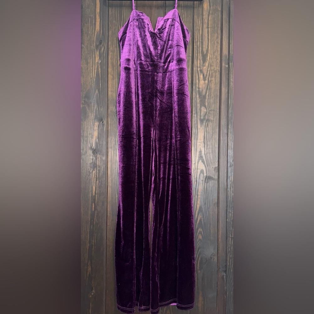 Royal purple velvet pants jumpsuit with V neckline detail